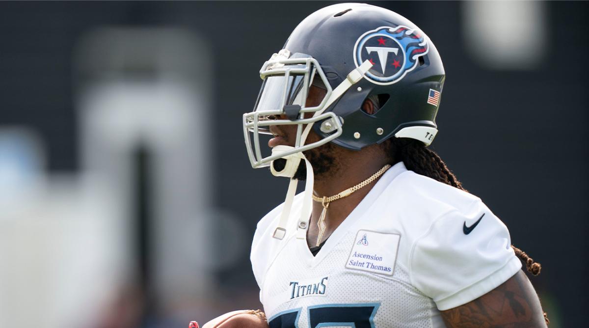 Tennessee Titans running back Derrick Henry (22) runs with the ball during a training camp practice at Ascension Saint Thomas Sports Park Saturday, July 30, 2022, in Nashville, Tenn.