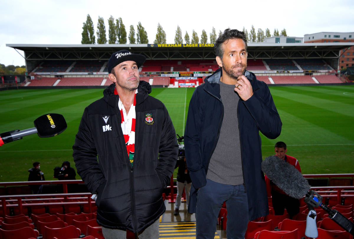 Wrexham AFC co-owners Rob McElhenney (left) and Ryan Reynolds pictured during a press conference at the Racecourse Ground after buying the club in 2021