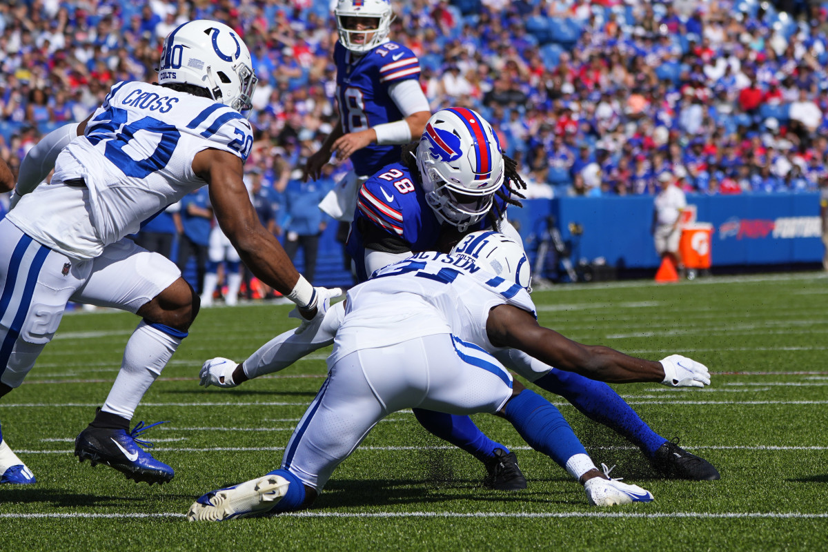 Aug 13, 2022; Orchard Park, New York, USA; Indianapolis Colts safety Brandon Facyson (31) tackles Buffalo Bills running back James Cook (28) during the first half at Highmark Stadium. Mandatory Credit: Gregory Fisher-USA TODAY Sports