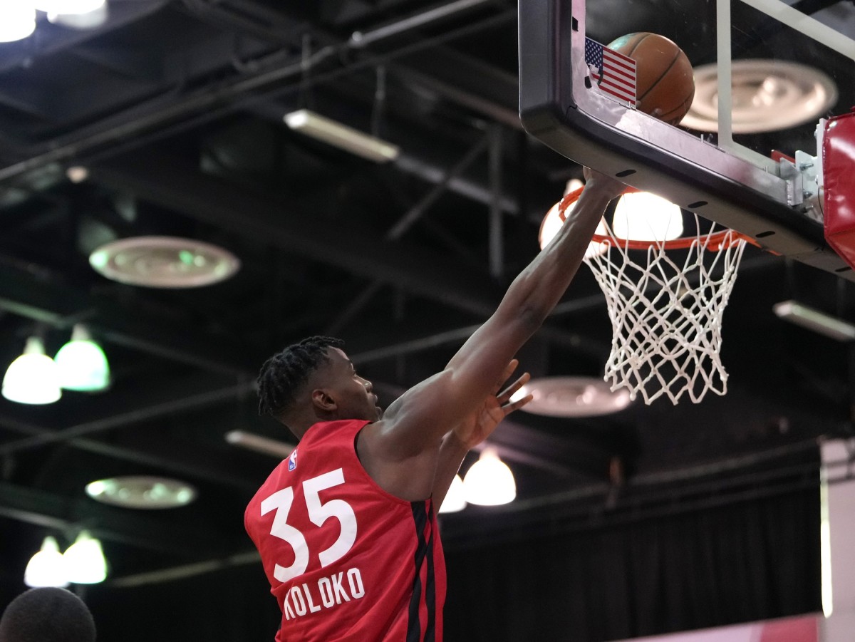 Toronto Raptors center Christian Koloko (35) shoots against the Philadelphia 76ers during an NBA Summer League game at Cox Pavilion