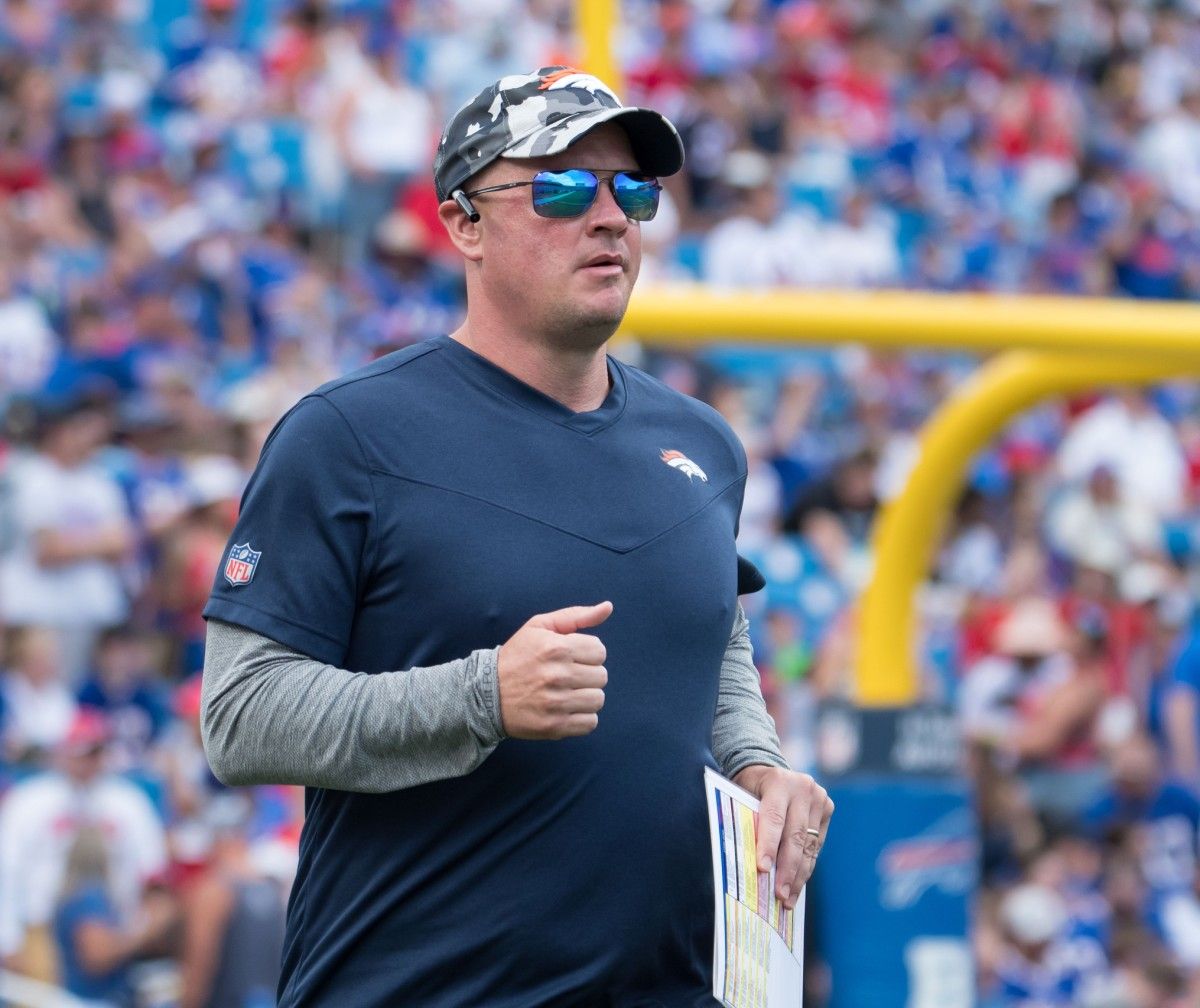 Denver Broncos head coach Nathaniel Hackett enters the field before a pre-season game against the Buffalo Bills at Highmark Stadium.