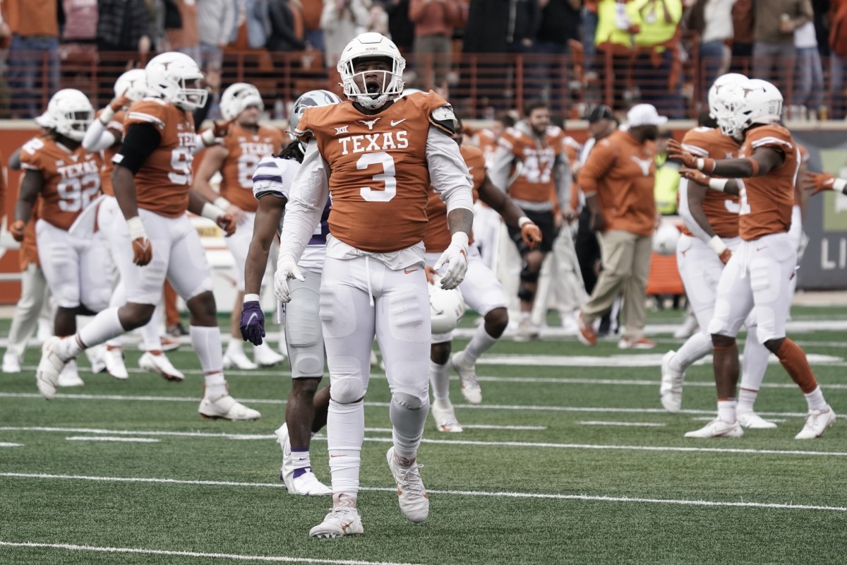 Nov 26, 2021; Austin, Texas, USA; Texas Longhorns defensive end Jacoby Jones (3) celebrates after a victory over the Kansas State Wildcats at Darrell K Royal-Texas Memorial Stadium.