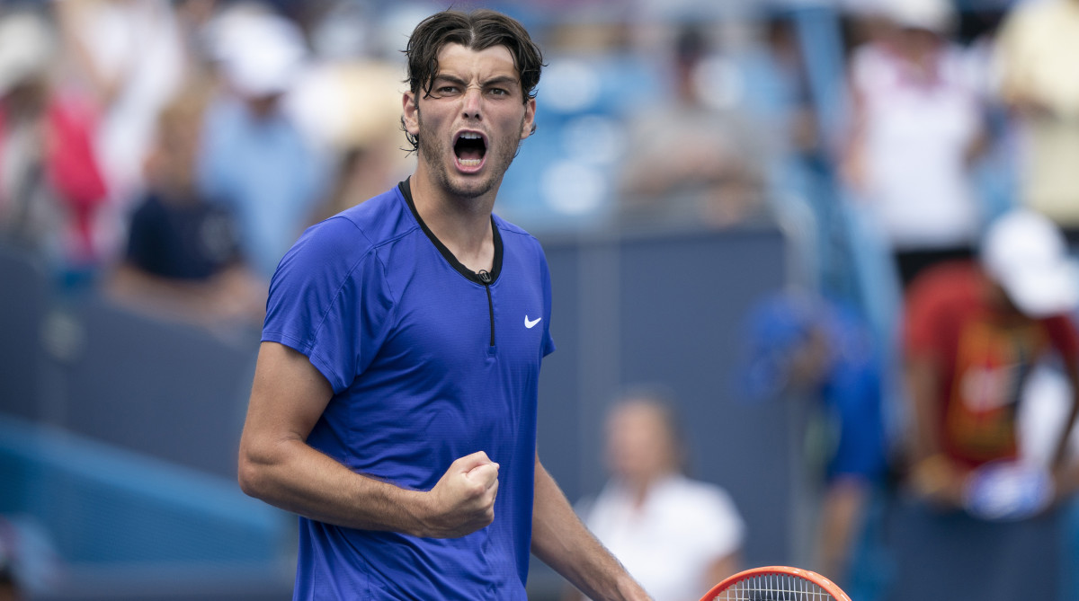 Taylor Fritz reacts to a point during his match against Andrey Rublev at the Western and Southern Open.