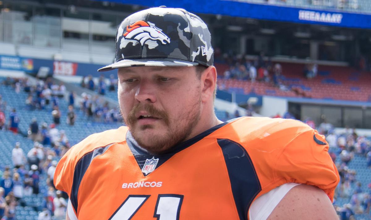 Denver Broncos guard Graham Glasgow (61) leaves the field after a pre-season game against the Buffalo Bills at Highmark Stadium.