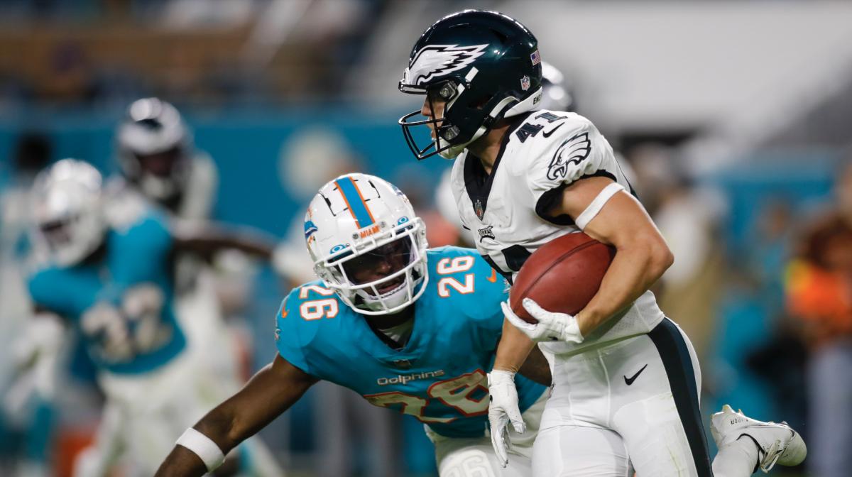 Philadelphia Eagles wide receiver Britain Covey (41) runs with the football ahead of Miami Dolphins running back Salvon Ahmed (26) during the fourth quarter at Hard Rock Stadium.