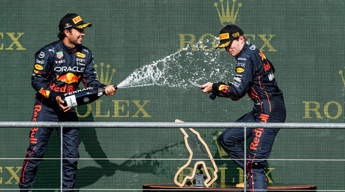 Oracle Red Bull Racing Mexican rider Sergio Perez and Oracle Red Bull Racing Dutch rider Max Verstappen celebrate after the F1 Grand Prix of Belgium