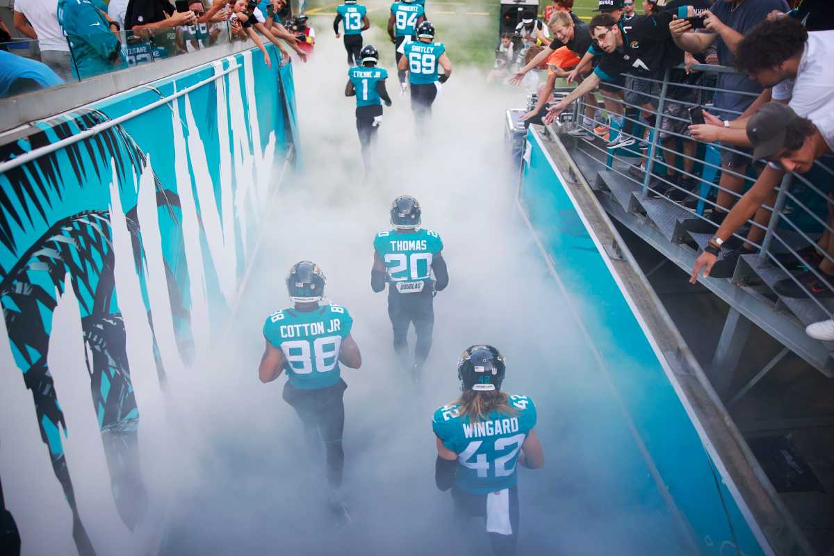Jacksonville Jaguars safety Daniel Thomas #20, wide receiver Jeff Cotton Jr. #88 and safety Andrew Wingard #42 run from the tunnel to the field before anduring the first quarter of an NFL preseason game Saturday, Aug. 20, 2022 at TIAA Bank Field in Jacksonville. [Corey Perrine/Florida Times-Union] Jki 082022 Jags Vs Steelers Cp 73