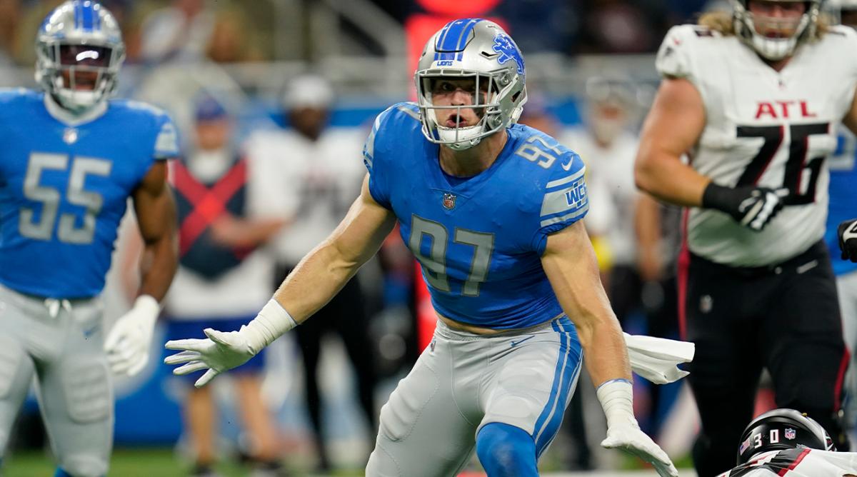 Detroit Lions defensive end Aidan Hutchinson reacts after tackling Atlanta Falcons running back Qadree Ollison during the first half of a preseason NFL football game, Friday, Aug. 12, 2022, in Detroit.