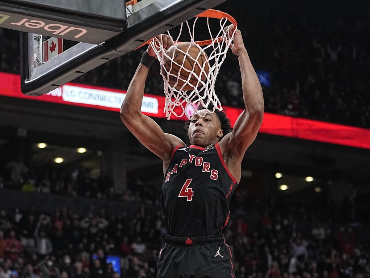 Toronto Raptors forward Scottie Barnes (4) dunks the ball against the Houston Rockets during the second half at Scotiabank Arena