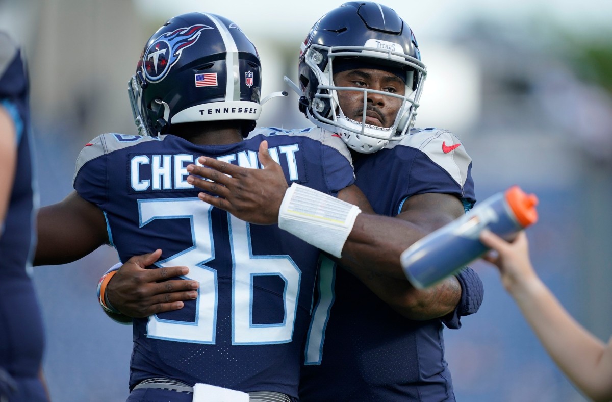 Tennessee Titans quarterback Malik Willis (7) hugs running back Julius Chestnut (36) before an NFL preseason game against the Arizona Cardinals at Nissan Stadium Saturday, Aug. 27, 2022, in Nashville, Tenn.