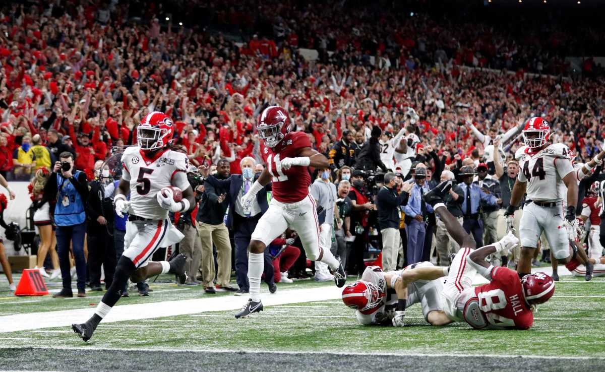 Kelee Ringo glides into the end zone for a game-sealing pick six against the Alabama Crimson Tide in the national championship.