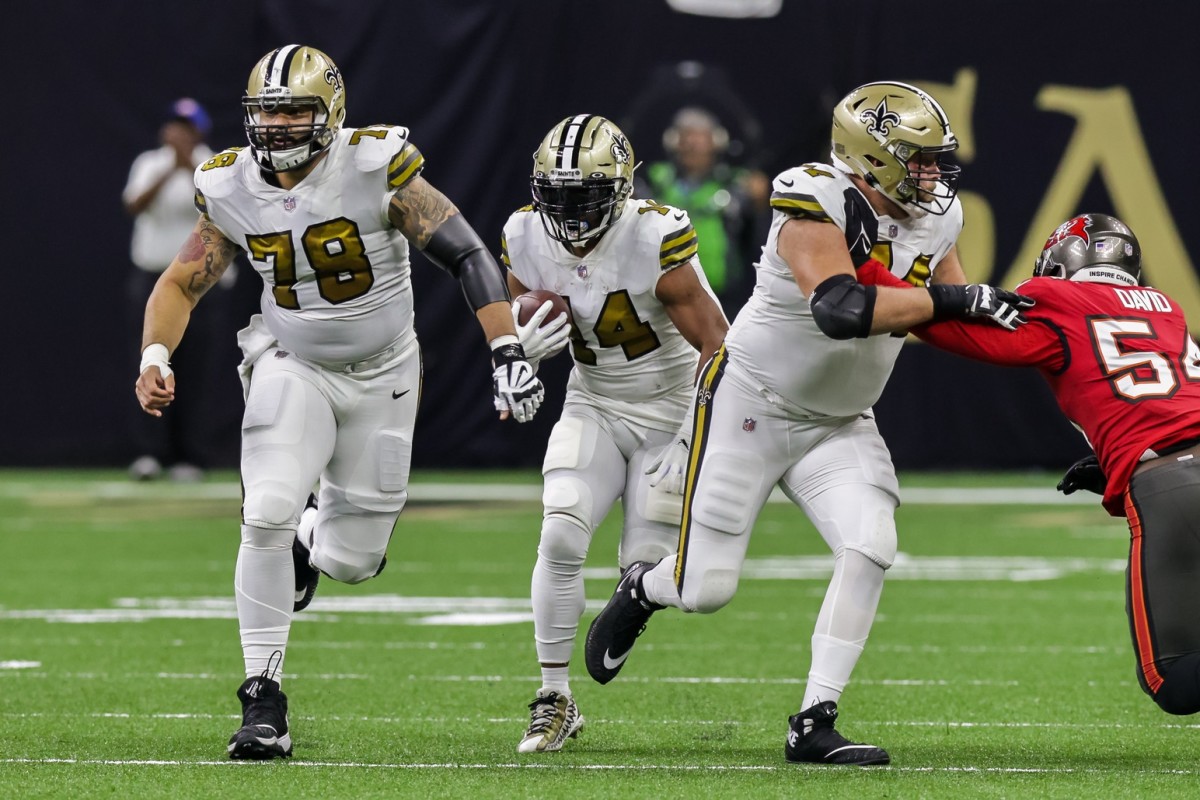 Oct 31, 2021; New Orleans Saints center Erik McCoy (78) and tackle Ryan Ramczyk (78) block for running back Mark Ingram II (14) against the Tampa Bay Buccaneers. Mandatory Credit: Stephen Lew-USA TODAY Sports