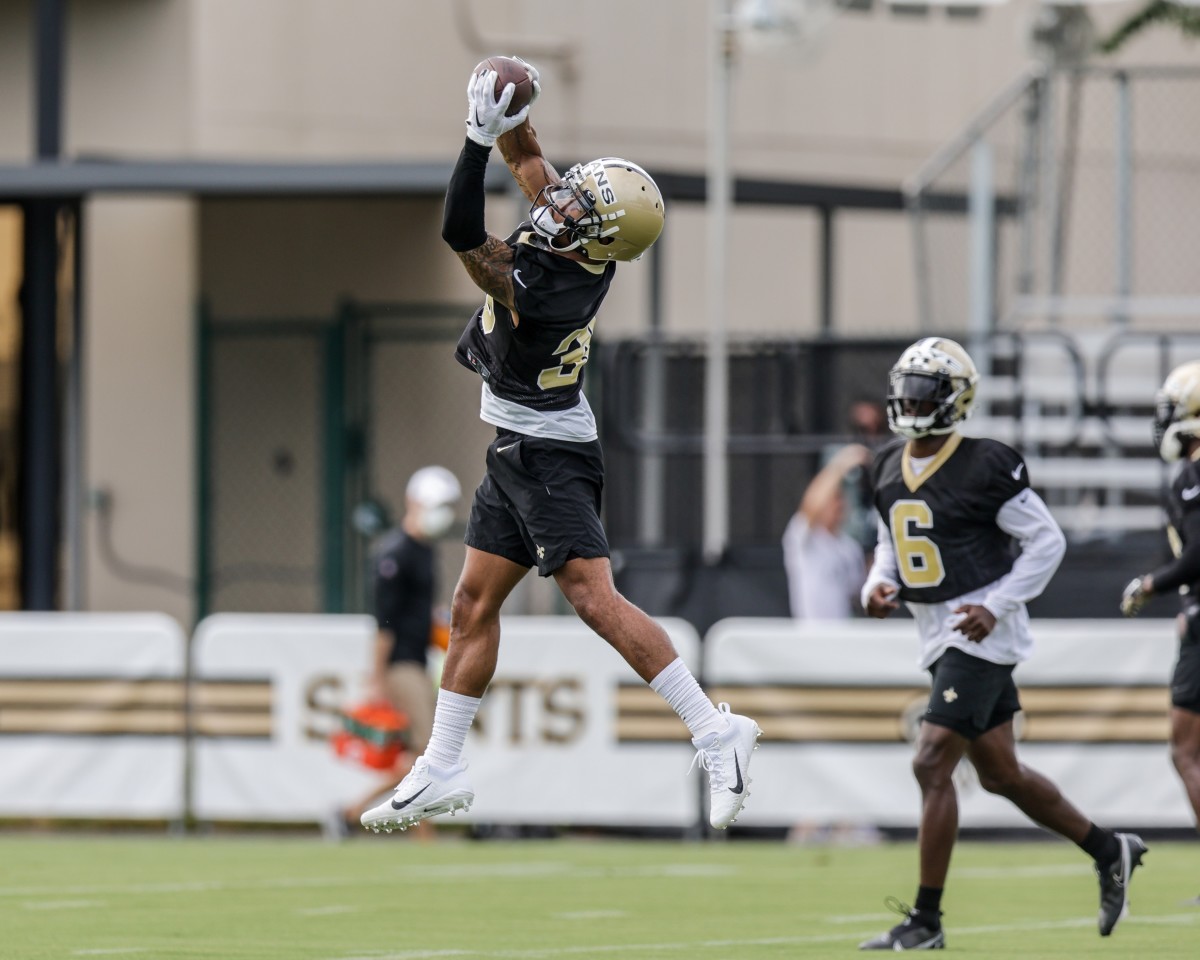 New Orleans Saints defensive back Justin Evans (30) catches a pass during training camp. Mandatory Credit: Stephen Lew-USA TODAY Sports
