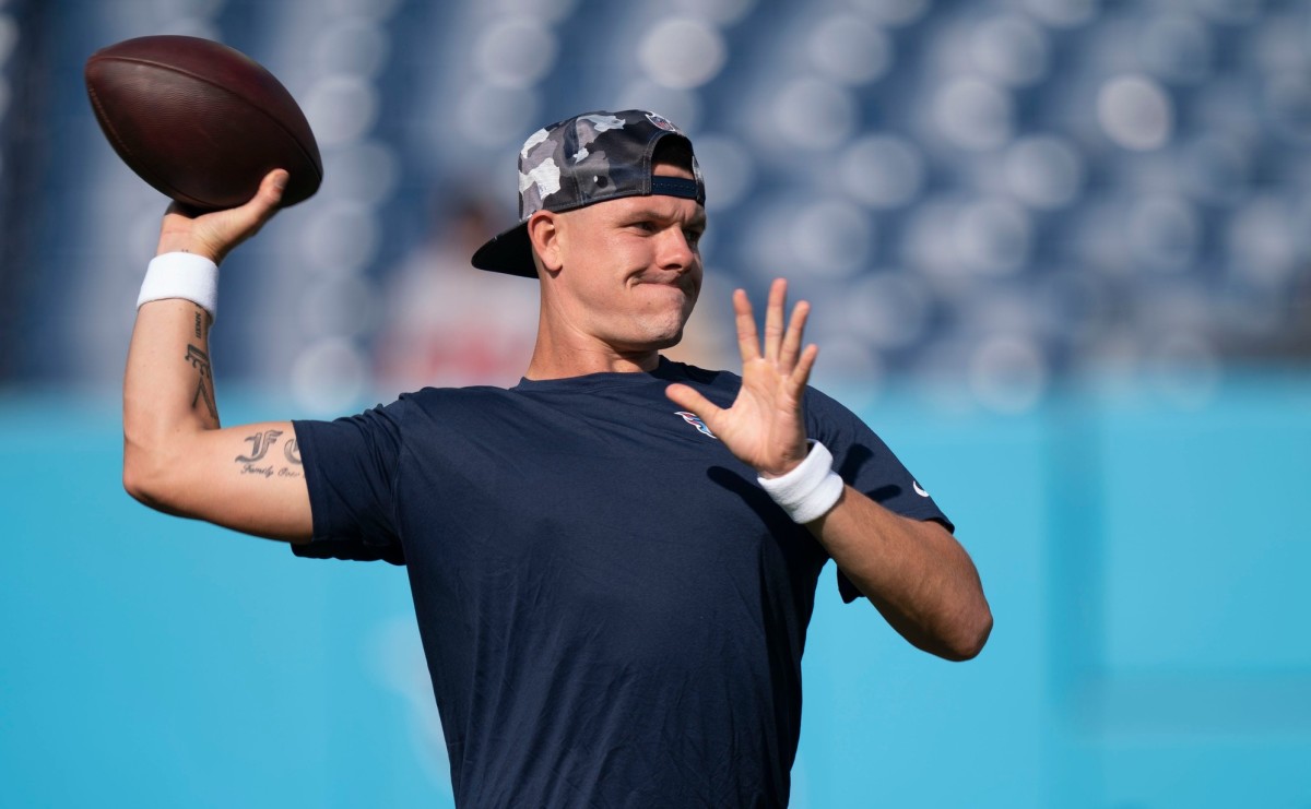 Tennessee Titans quarterback Logan Woodside (5) warms up before an NFL preseason game against the Arizona Cardinals at Nissan Stadium Saturday, Aug. 27, 2022, in Nashville, Tenn.