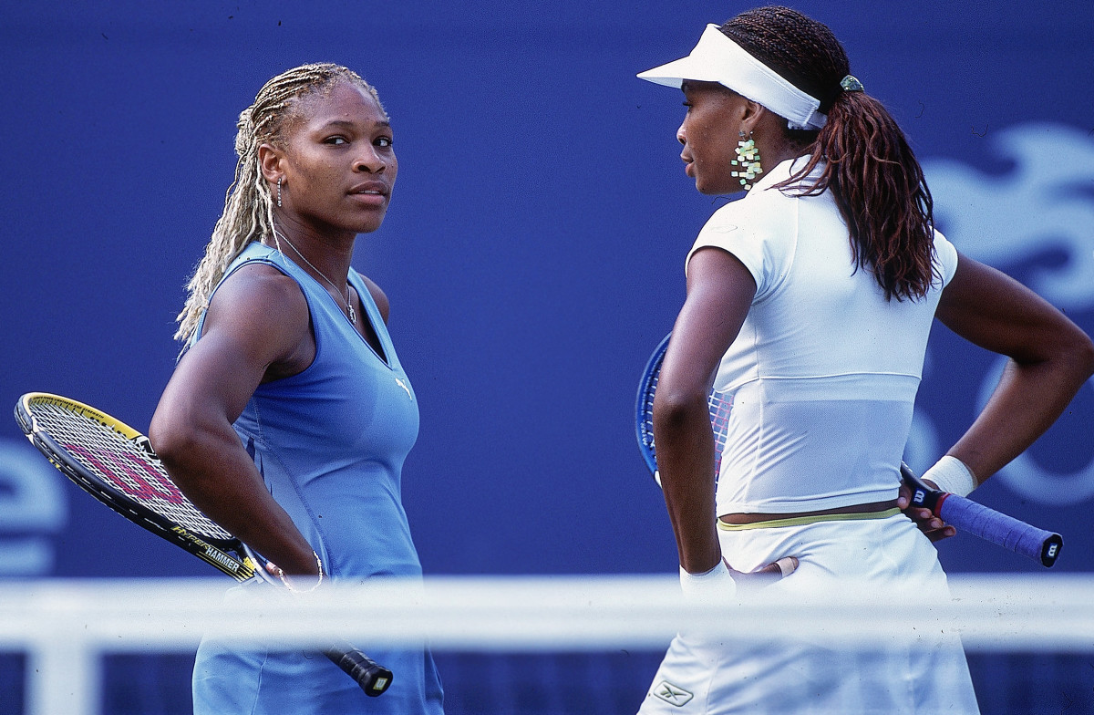 Serena and Venus Williams during a doubles match at 2001 U.S. Open.