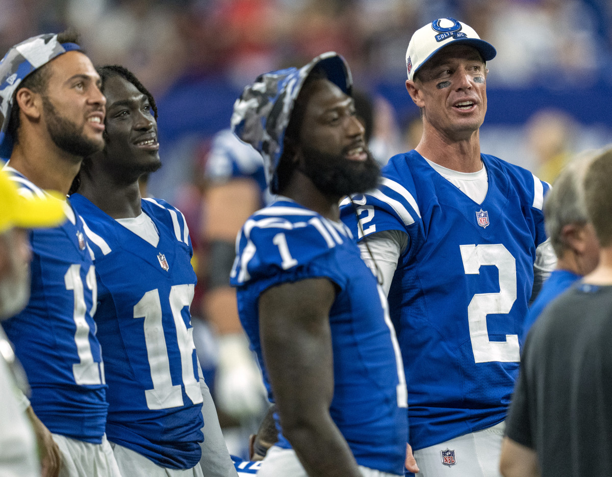 Aug 27, 2022; Indianapolis, Indiana, USA; Indianapolis Colts quarterback Matt Ryan (2) stands with offensive teammates during a preseason victory over the Tampa Bay Buccaneers at Lucas Oil Stadium.