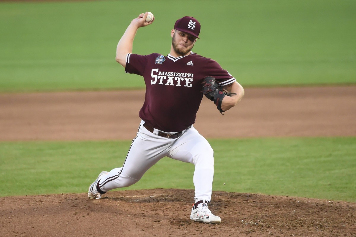 Landon Sims throws a pitch for Mississippi State in the 2021 College World Series.