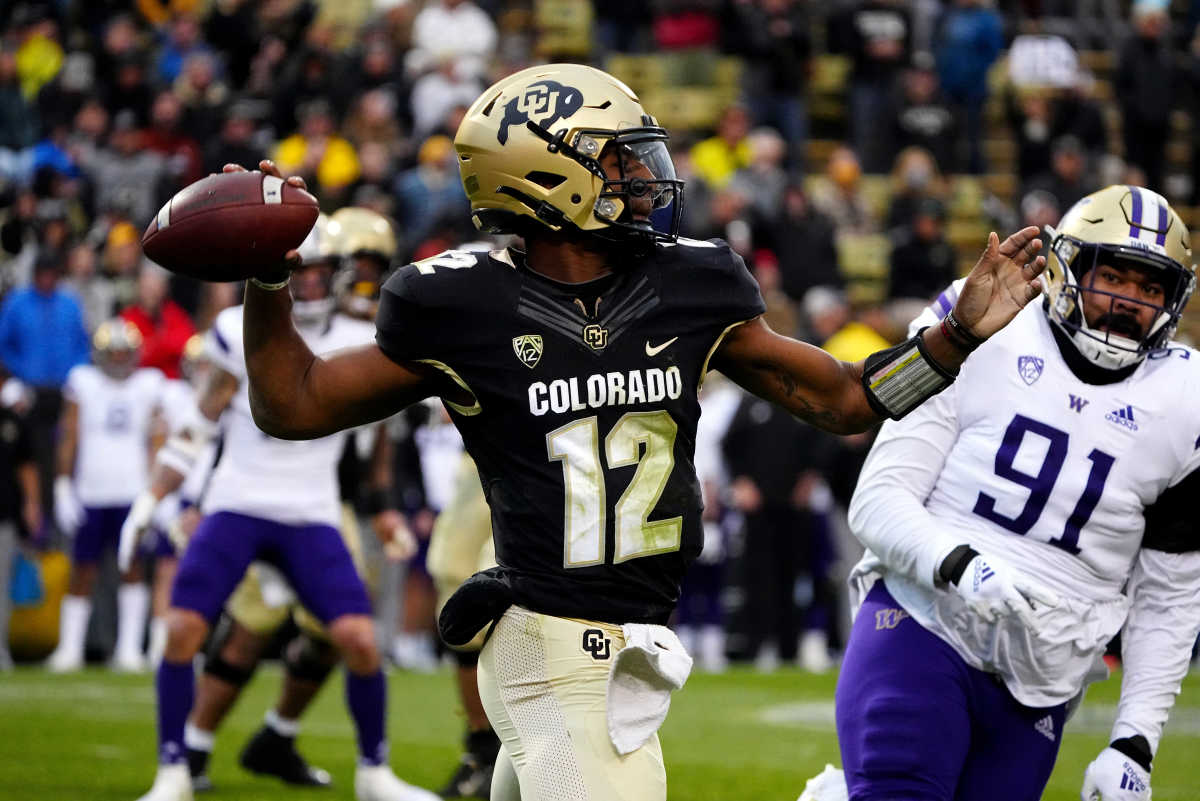 Nov 20, 2021; Boulder, Colorado, USA; Colorado Buffaloes quarterback Brendon Lewis (12) prepares to pass in the third quarter against the Washington Huskies at Folsom Field. Mandatory Credit: Ron Chenoy-USA TODAY Sports