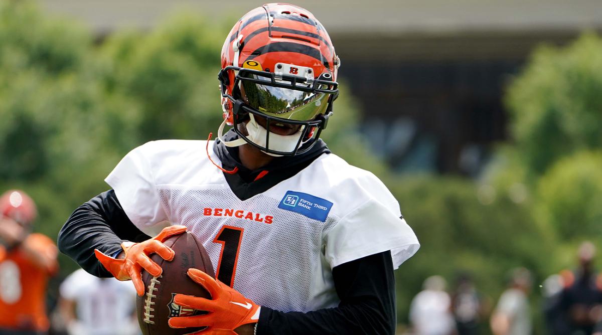 Aug 1, 2022; Cincinnati, OH, USA; Cincinnati Bengals wide receiver Ja’Marr Chase (1) turns downfield after completing a catch during Cincinnati Bengals training camp practice, Monday, Aug. 1, 2022, at the practice fields next to Paul Brown Stadium in Cincinnati.