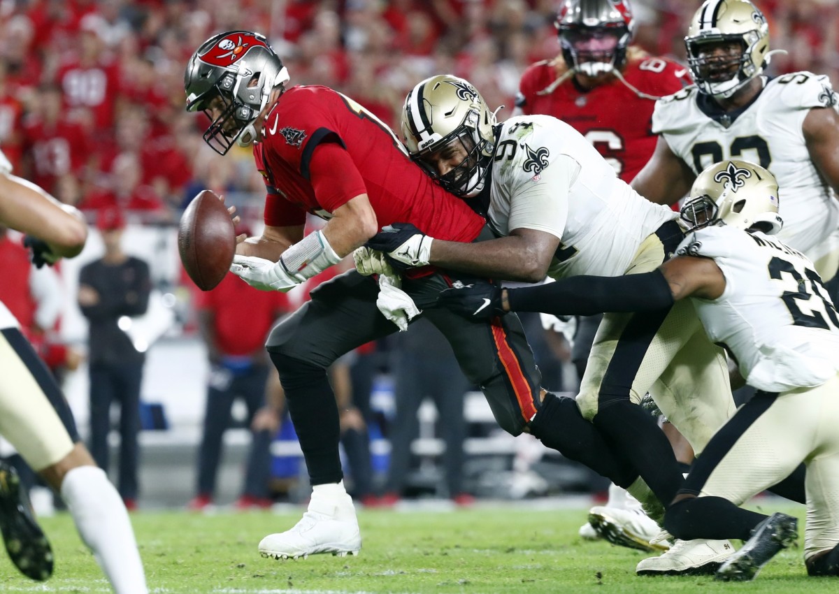 New Orleans Saints defensive end Cameron Jordan (94) sacks Tampa Bay Buccaneers quarterback Tom Brady (12) and forces a fumble of the ball. Mandatory Credit: Kim Klement-USA TODAY Sports