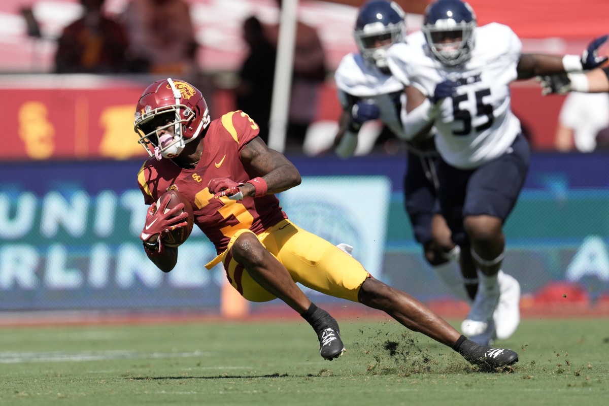 Photos: USC football explodes for 66-14 win over Rice in first game ...