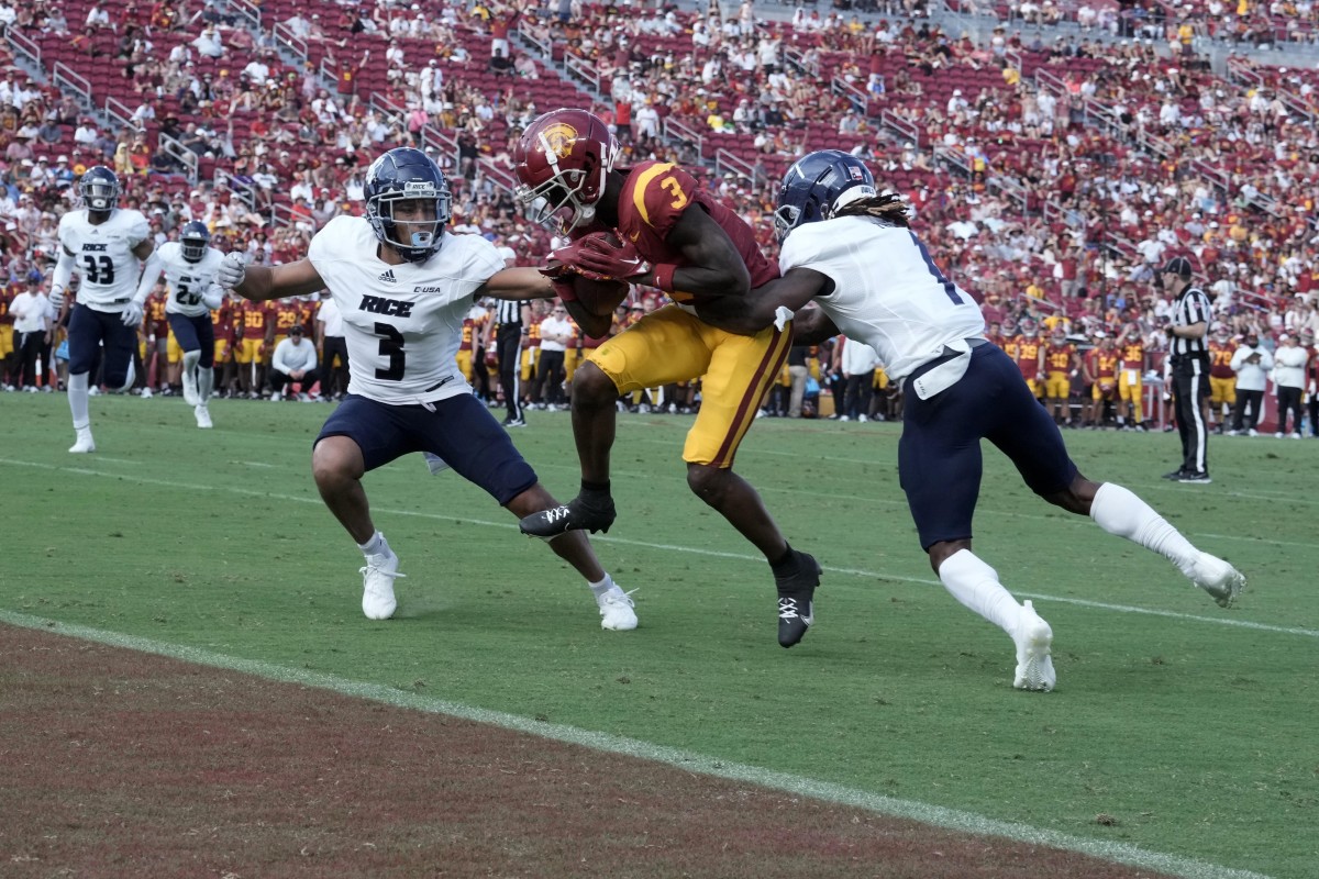Photos: USC football explodes for 66-14 win over Rice in first game ...