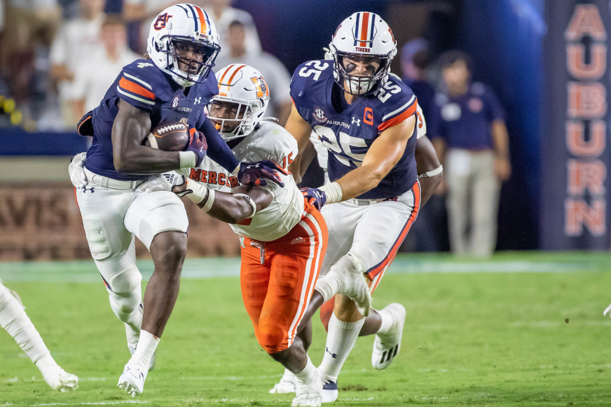 Auburn Tigers running back Tank Bigsby (4) carries for a first down during the game between the Mercer Bears and the Auburn Tigers at Jordan-Hare Stadium on Sept. 3, 2022.