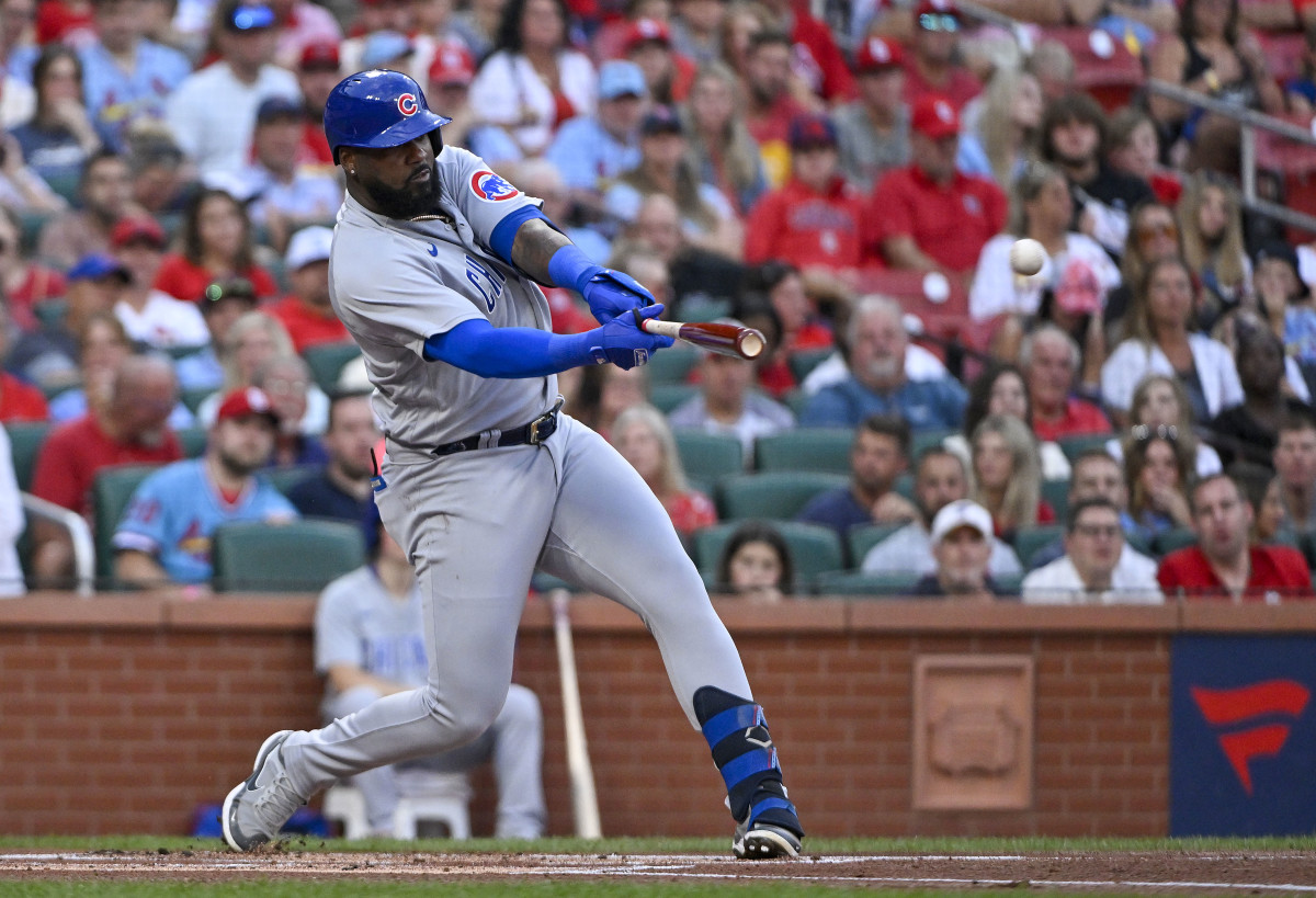 Chicago Cubs designated hitter Franmil Reyes collects an RBI base hit against the Cardinals on Saturday. 