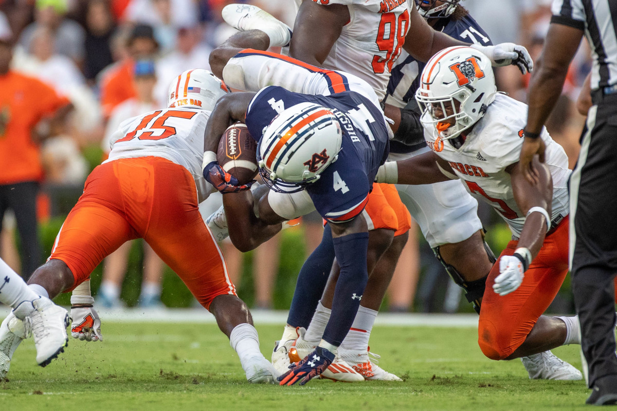 Auburn Tigers running back Tank Bigsby (4) dives over the middle during the game between the Mercer Bears and the Auburn Tigers at Jordan-Hare Stadium on Sept. 3, 2022.
