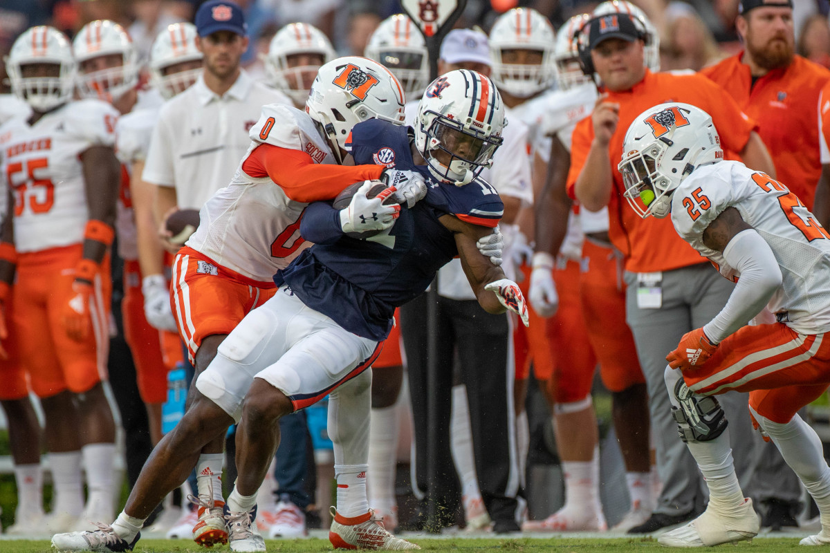 Auburn Tigers wide receiver Malcolm Johnson Jr. (16)stretches for more yardage during the game between the Mercer Bears and the Auburn Tigers at Jordan-Hare Stadium on Sept. 3, 2022.
