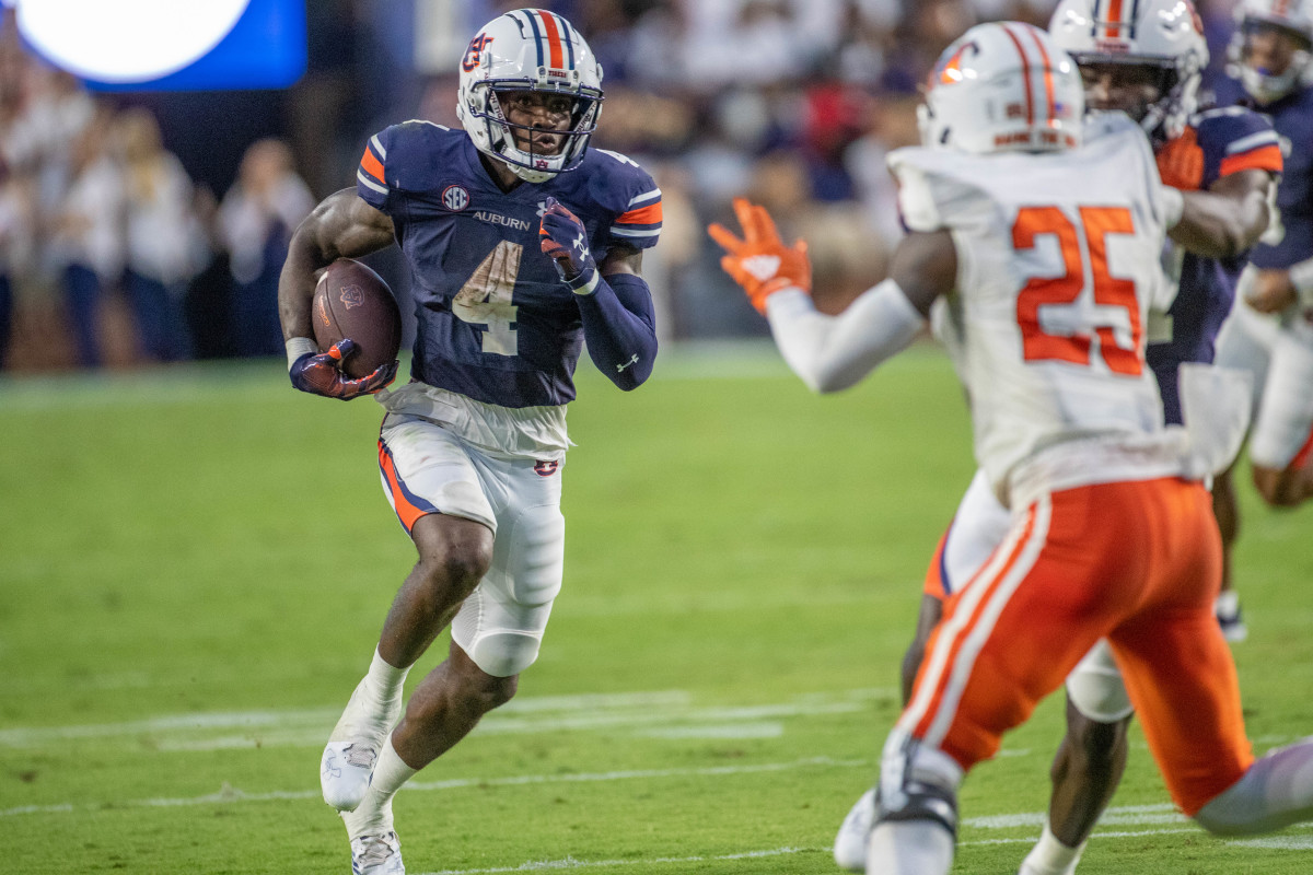 Auburn Tigers running back Tank Bigsby (4) looks for a hole during the game between the Mercer Bears and the Auburn Tigers at Jordan-Hare Stadium on Sept. 3, 2022.