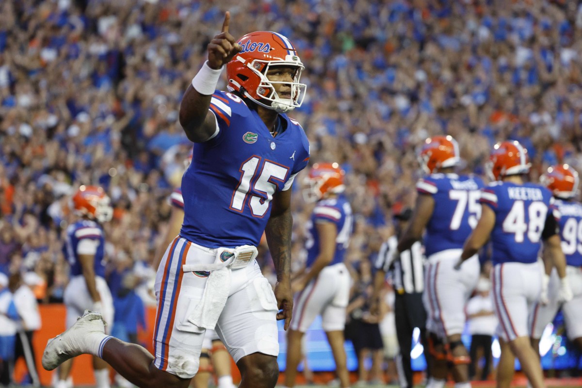 Florida Gators quarterback Anthony Richardson (15) points after he scores a touchdown against the Utah Utes during the first quarter at Steve Spurrier-Florida Field.