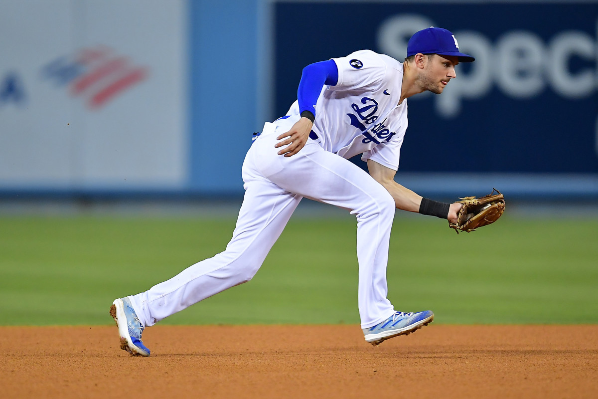 Dodgers infielder Trea Turner fields a grounder. Could the SF Giants steal him away from their rival this offseason?