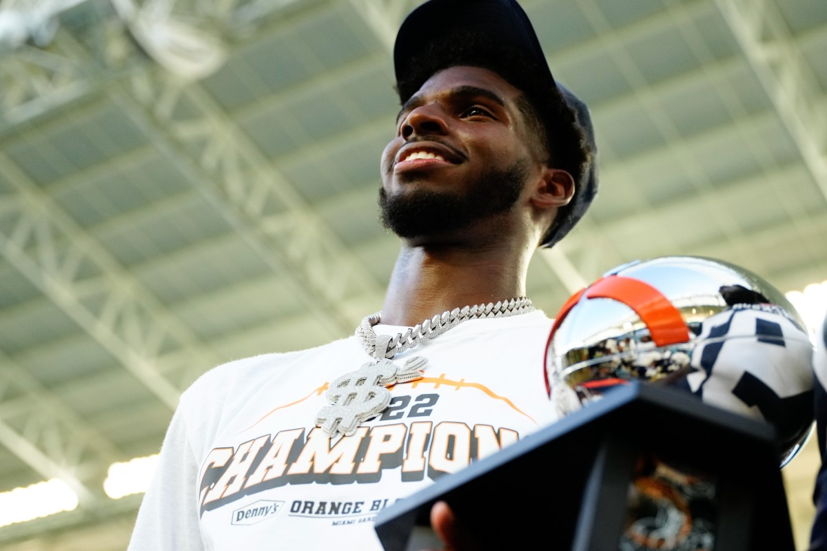 Sep 4, 2022; Miami, Florida, US; Jackson State Tigers quarterback Shedeur Sanders (2) holds Orange Blossom Classic Trophy after a game against the Florida A&M Rattlers at Hard Rock Stadium. Mandatory Credit: Rich Storry-USA TODAY Sports