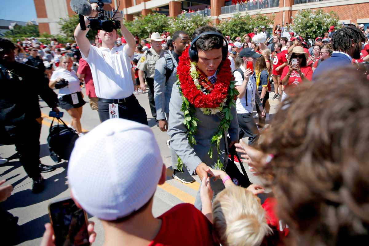 Dillon Gabriel with Oklahoma fans at the Walk of Champions before Saturday's home opener