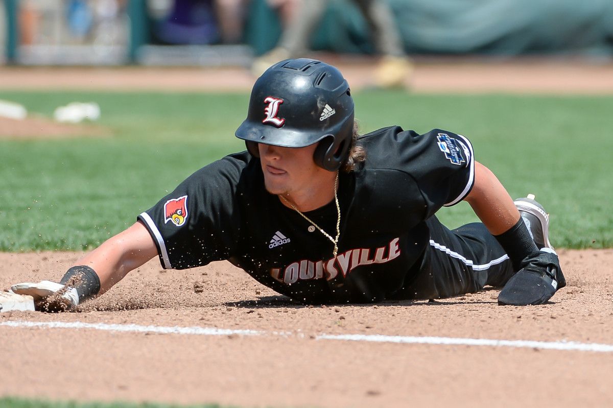 SF Giants prospect Tyler Fitzgerald diving back to first base during his college career at Louisville.