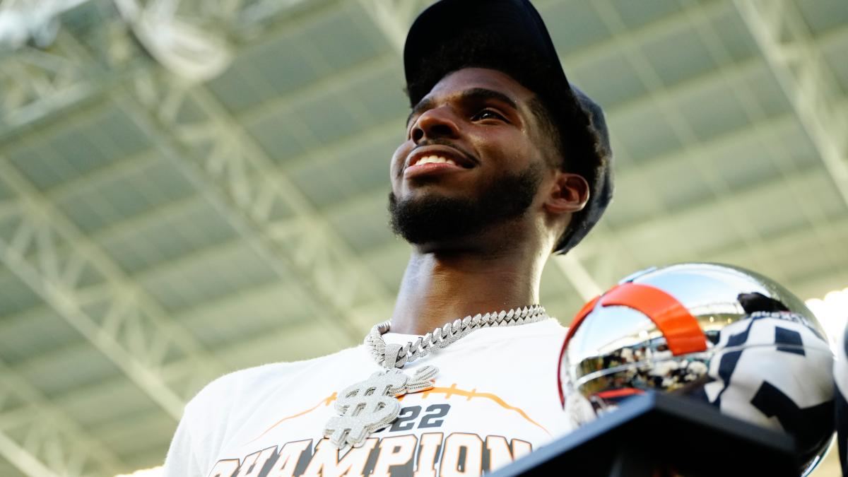 Sep 4, 2022; Miami, Florida, US; Jackson State Tigers quarterback Shedeur Sanders (2) holds Orange Blossom Classic Trophy after a game against the Florida A&M Rattlers at Hard Rock Stadium.