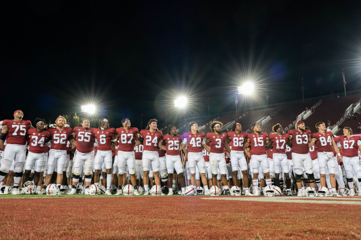 Stanford Cardinal football players gather and sing for fans after defeating the Colgate Raiders at Stanford Stadium. Mandatory Credit: Stan Szeto-USA TODAY Sports