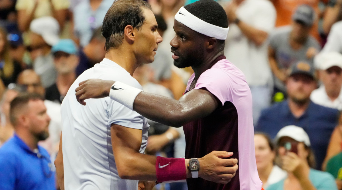 Sept 5, 2022; Flushing, NY, USA; Frances Tiafoe of the USA, right, greets Rafael Nadal of Spain at the net after their match on day eight of the 2022 U.S. Open tennis tournament at USTA Billie Jean King National Tennis Center. Mandatory Credit: Robert Deutsch-USA TODAY Sports