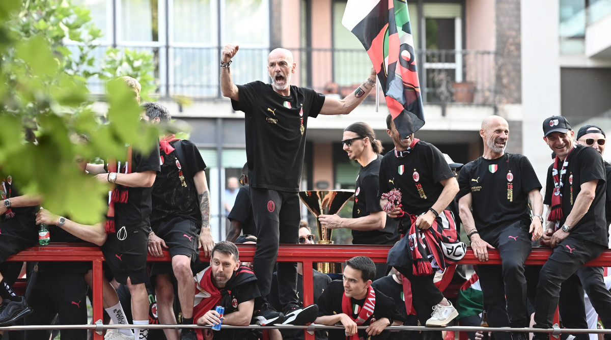 AC Milan manager Stefano Pioli celebrating the Serie A title.