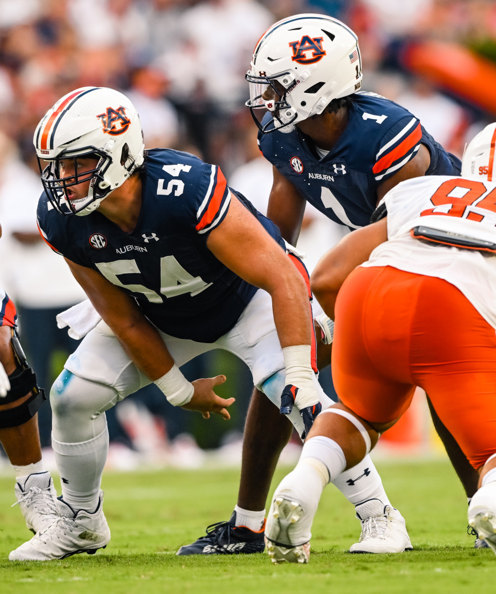 Sep 3, 2022; Auburn, Al, USA; Tate Johnson (54), T.J. Finley (1) receives the hike during the game between Auburn and Mercer at Jordan-Hare Stadium.