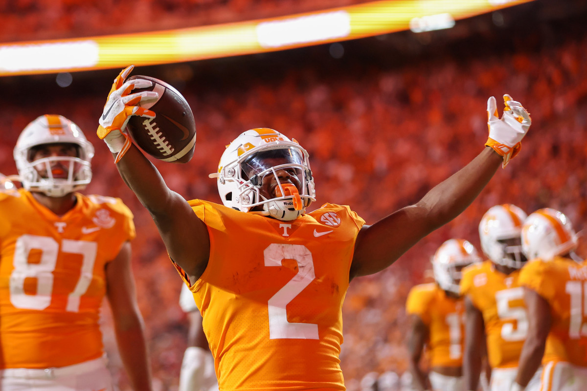 Sep 1, 2022; Knoxville, Tennessee, USA; Tennessee Volunteers running back Jabari Small (2) celebrates after running for a touchdown against the Ball State Cardinals during the first half at Neyland Stadium. Mandatory Credit: Randy Sartin-USA TODAY Sports