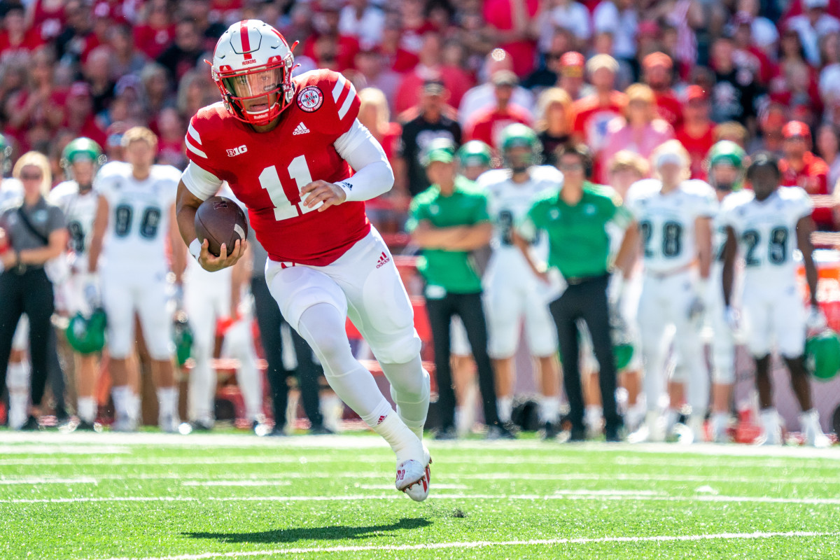 Nebraska Cornhuskers quarterback Casey Thompson (11) runs with the ball against the North Dakota Fighting Hawks during the second quarter at Memorial Stadium.