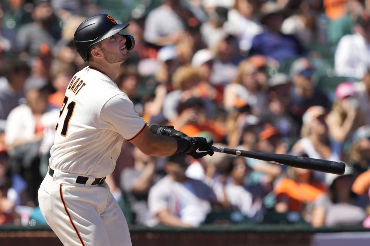 SF Giants catcher Joey Bart hits a single. (2022)