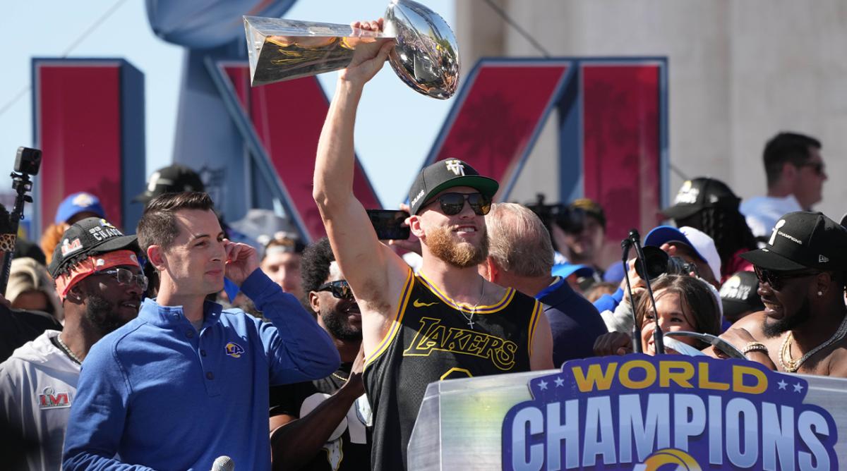 Feb 16, 2022; Los Angeles, CA, USA; Los Angeles Rams receiver Cooper Kupp holds the Vince Lombardi trophy during the Super Bowl LVI championship rally at the Los Angeles Memorial Coliseum.
