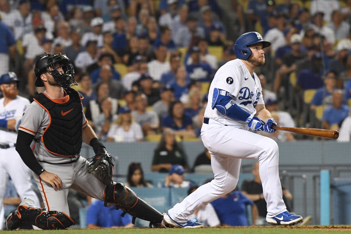 SF Giants catcher Joey Bart and Dodgers slugger Max Muncy watch a home run. (2022)