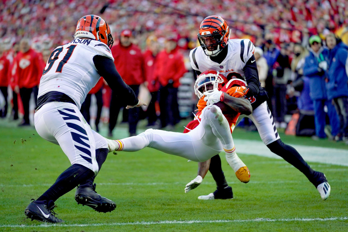 Eli Apple tackles Tyreek Hill at the goal line during the AFC title game in January 2022