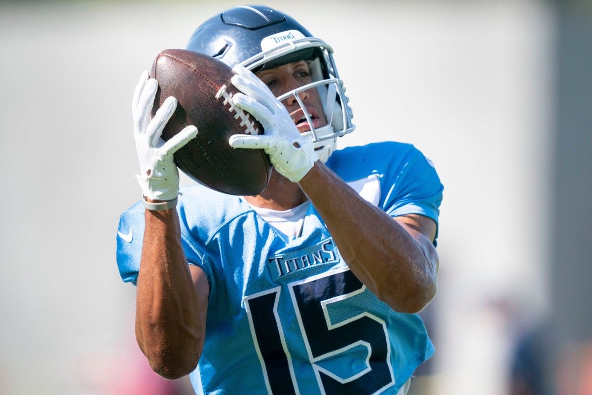 Tennessee Titans wide receiver Nick Westbrook-Ikhine (15) pulls in a catch during a joint training camp practice against the Tampa Bay Buccaneers at Ascension Saint Thomas Sports Park Thursday, Aug. 18, 2022, in Nashville, Tenn.