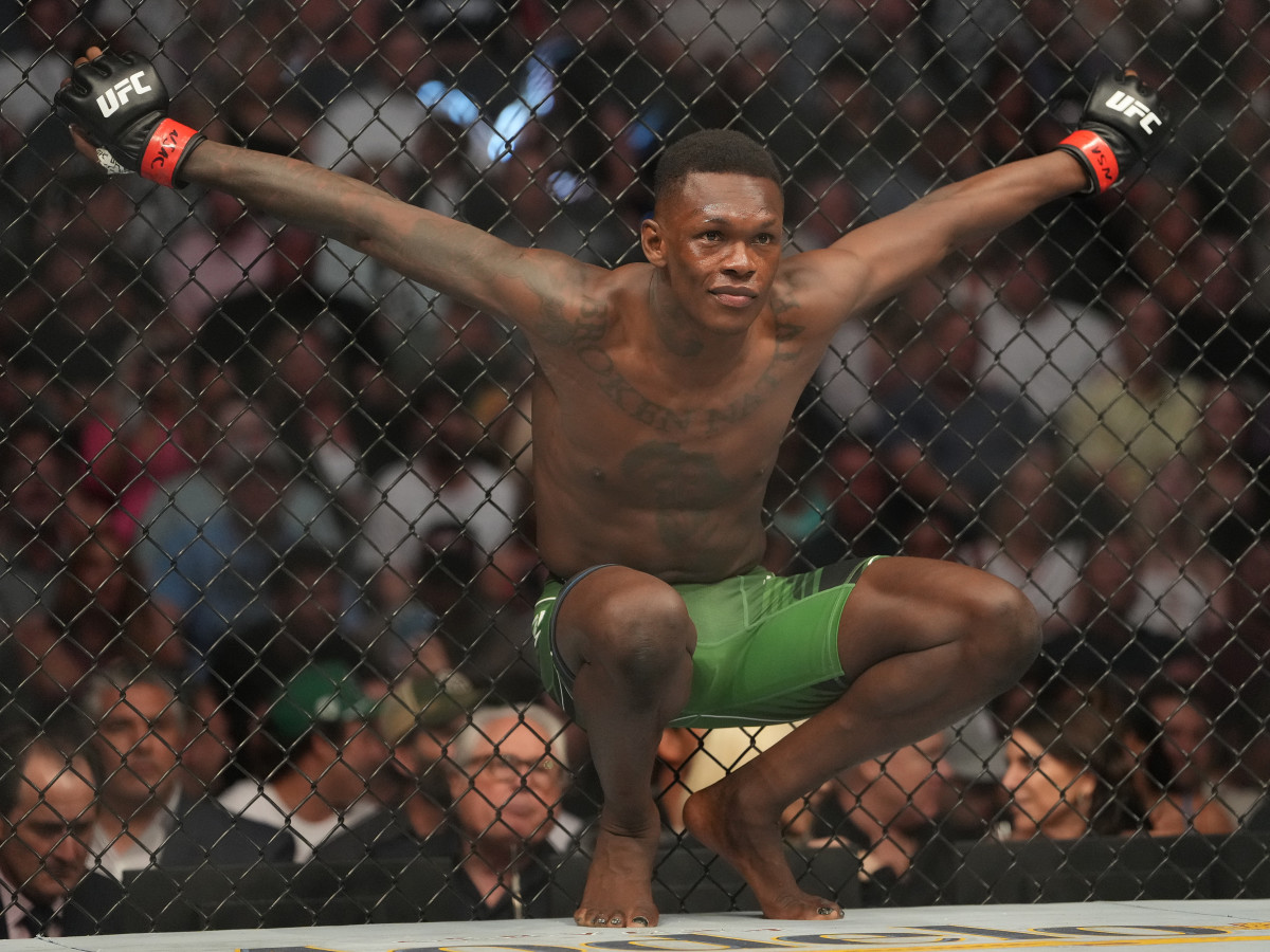 Israel Adesanya reacts before a bout against Jared Cannonier  during UFC 276 at T-Mobile Arena.