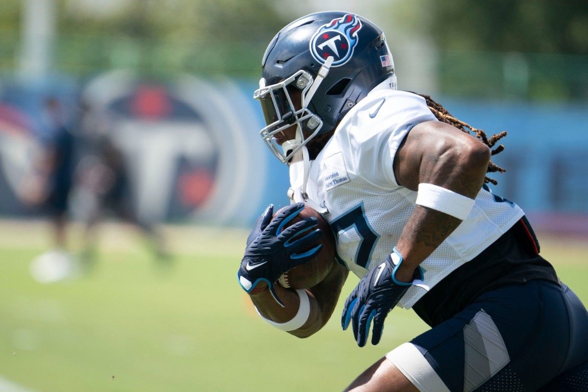 Tennessee Titans running back Derrick Henry (22) runs through drills during practice at Ascension Saint Thomas Sports Park Wednesday, Sept. 7, 2022, in Nashville, Tenn.